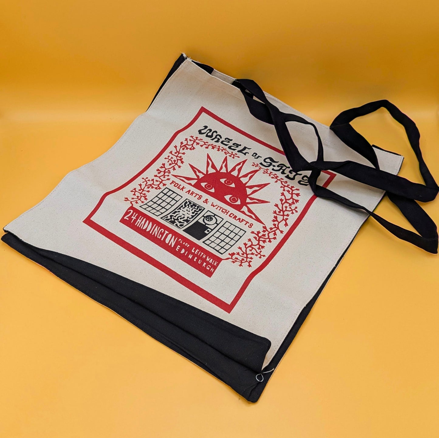Wheel of Fate Sun Tote: Black-Handled Thick Canvas Shopper