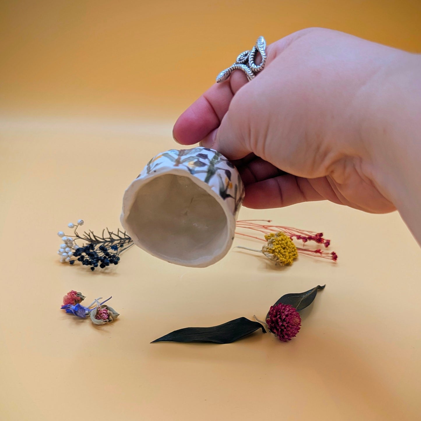 'Flower Saint' Ceramic Candle Snuffer by Ciara Veronica Dunne