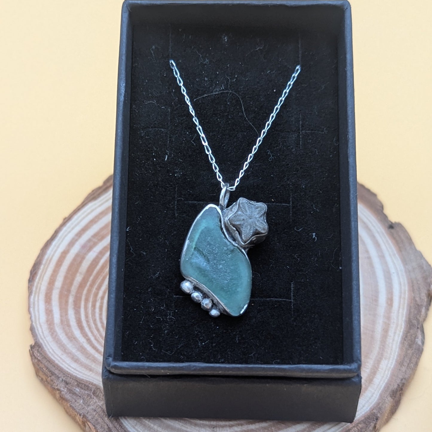 Glass and Crinoid Pendant